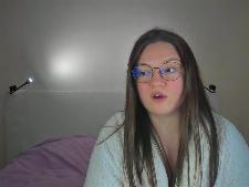 A normal cam lady with brown hair during cam sex