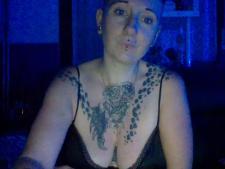 The European webcam girl Angelatattoo during one of the camseks performances