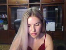 Our camgirl demonstrates the bra size C behind the sex cam