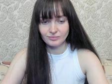A normal cam woman with brown hair during cam sex