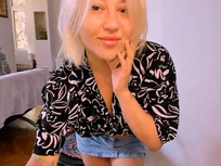 A shy wave and a denim tease